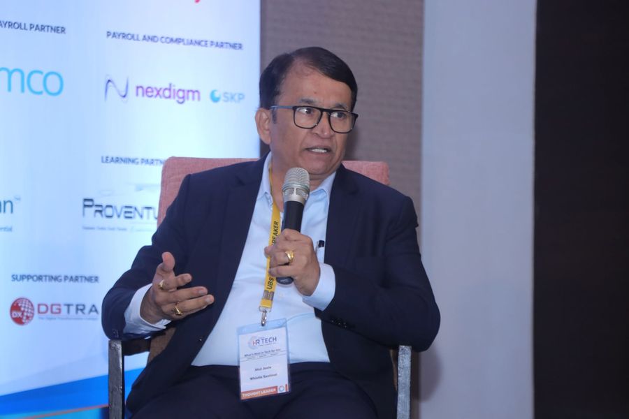 Atul Juvle speaking on a panel at the HR Tech Summit