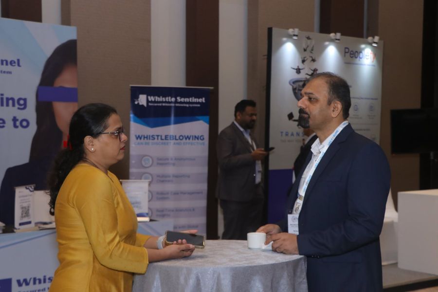 WhistleSentinel representatives networking at an industry event