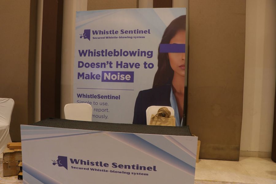 The WhistleSentinel booth display, "Whistleblowing Doesn't Have to Make Noise"